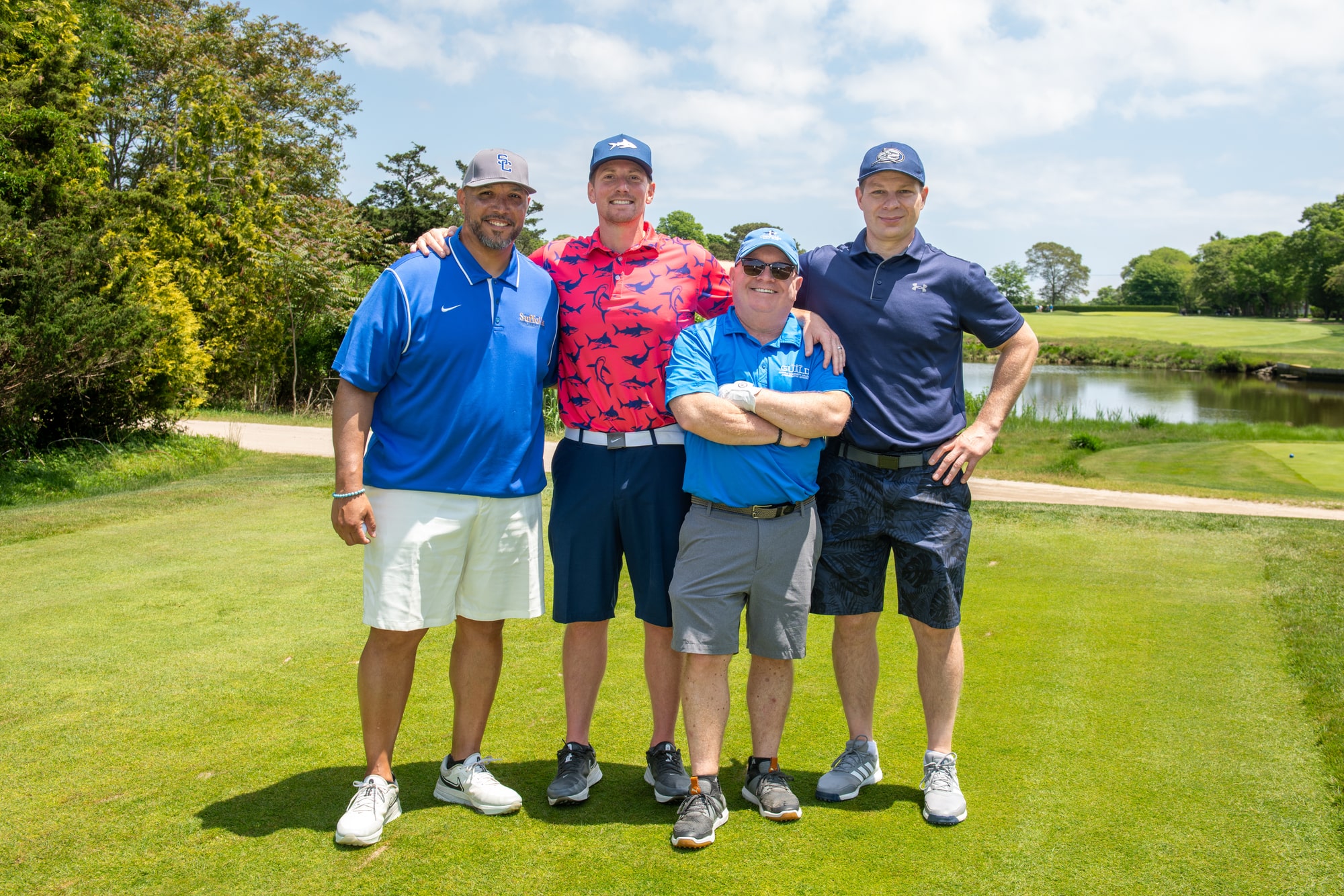 4 Men Golfing at Annual Fundraiser